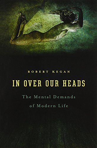 Book cover showing a figure swimming underwater with text In Over Our Heads above.