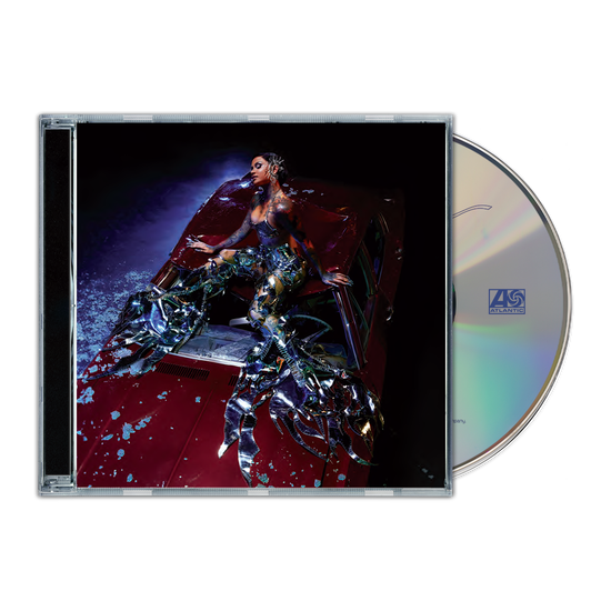 Kehlani's "CRASH" CD case and disc, featuring a person with robotic crab legs.