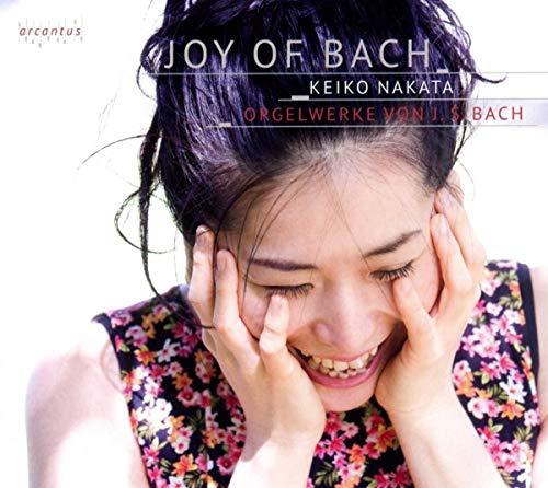 CD cover: Woman with eyes closed, hands framing face, smiling.