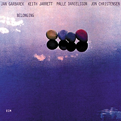 Album cover for Keith Jarrett’s “Belonging” featuring colorful orbs against a sky.