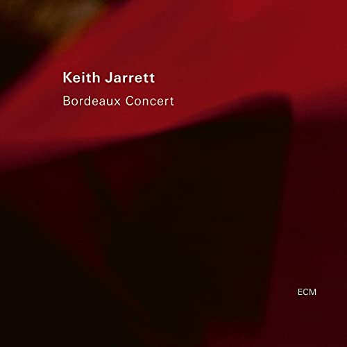 CD cover for Keith Jarrett’s “Bordeaux Concert” with red background.