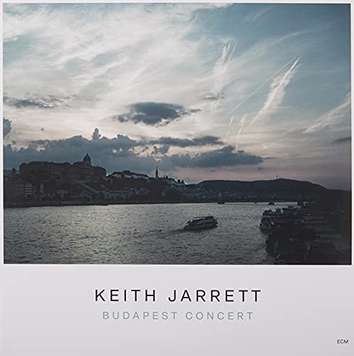 Vinyl album cover: cityscape under cloudy sky, text “Keith Jarrett Budapest Concert”.
