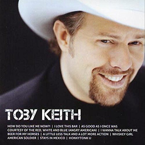 Toby Keith album cover, close-up of artist in a cowboy hat smiling.