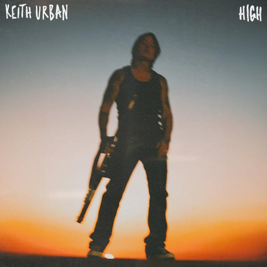 Keith Urban “HIGH” CD cover: silhouetted figure against an orange sky.