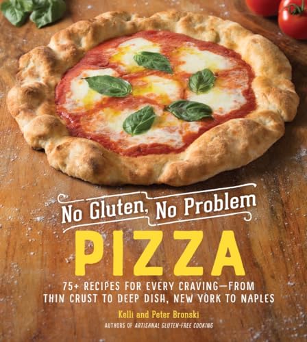 Gluten-free pizza with tomato sauce, cheese, and basil on a wooden surface.