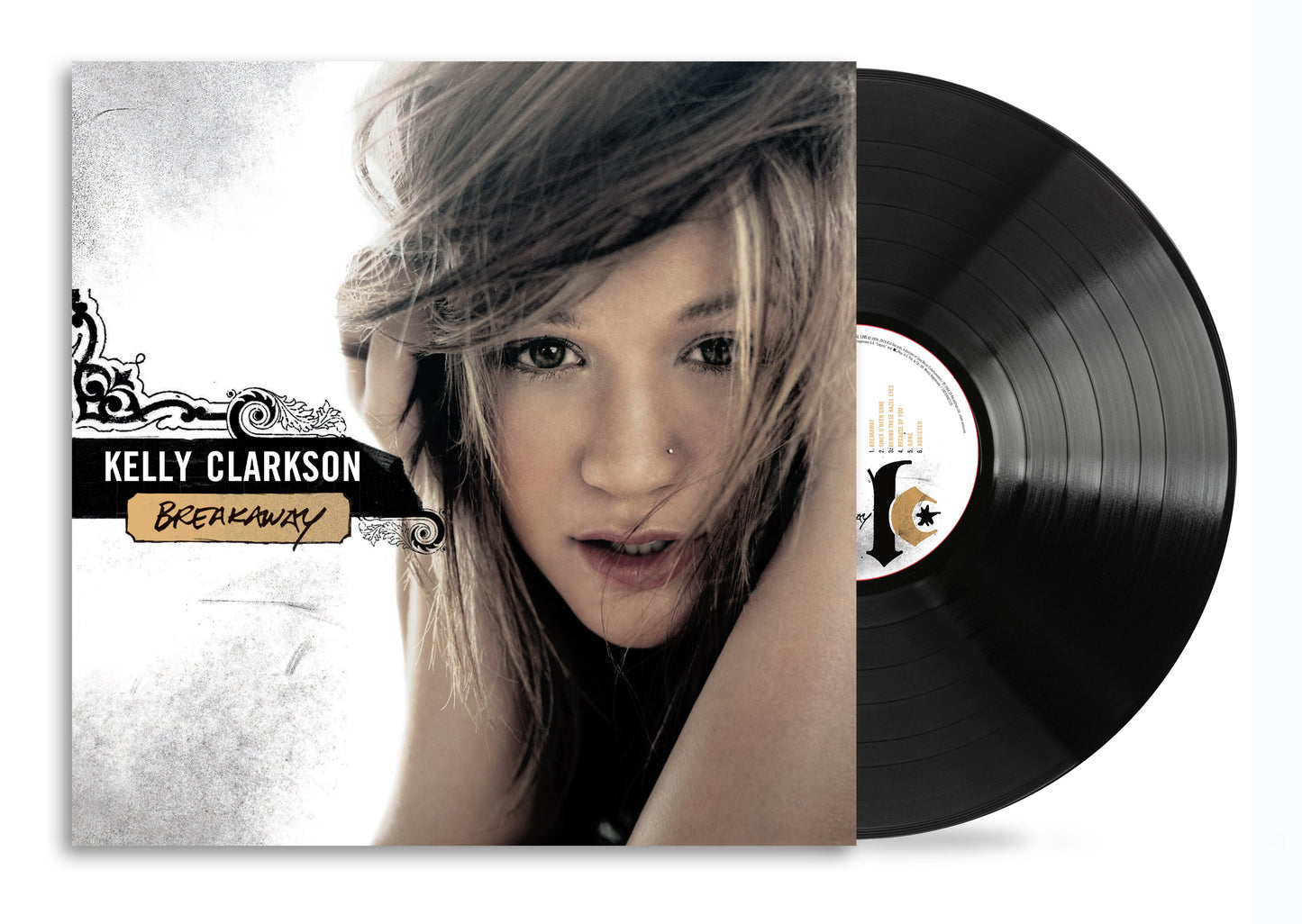 Kelly Clarkson Breakaway album cover art next to a black vinyl record.