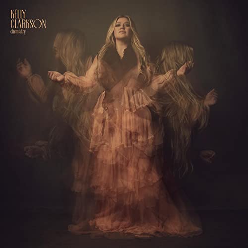 Kelly Clarkson album cover, featuring a blurred, ethereal portrait.