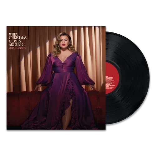 Kelly Clarkson album cover and black vinyl record displayed together.