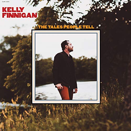 Vinyl record cover featuring a man standing by water and trees.
