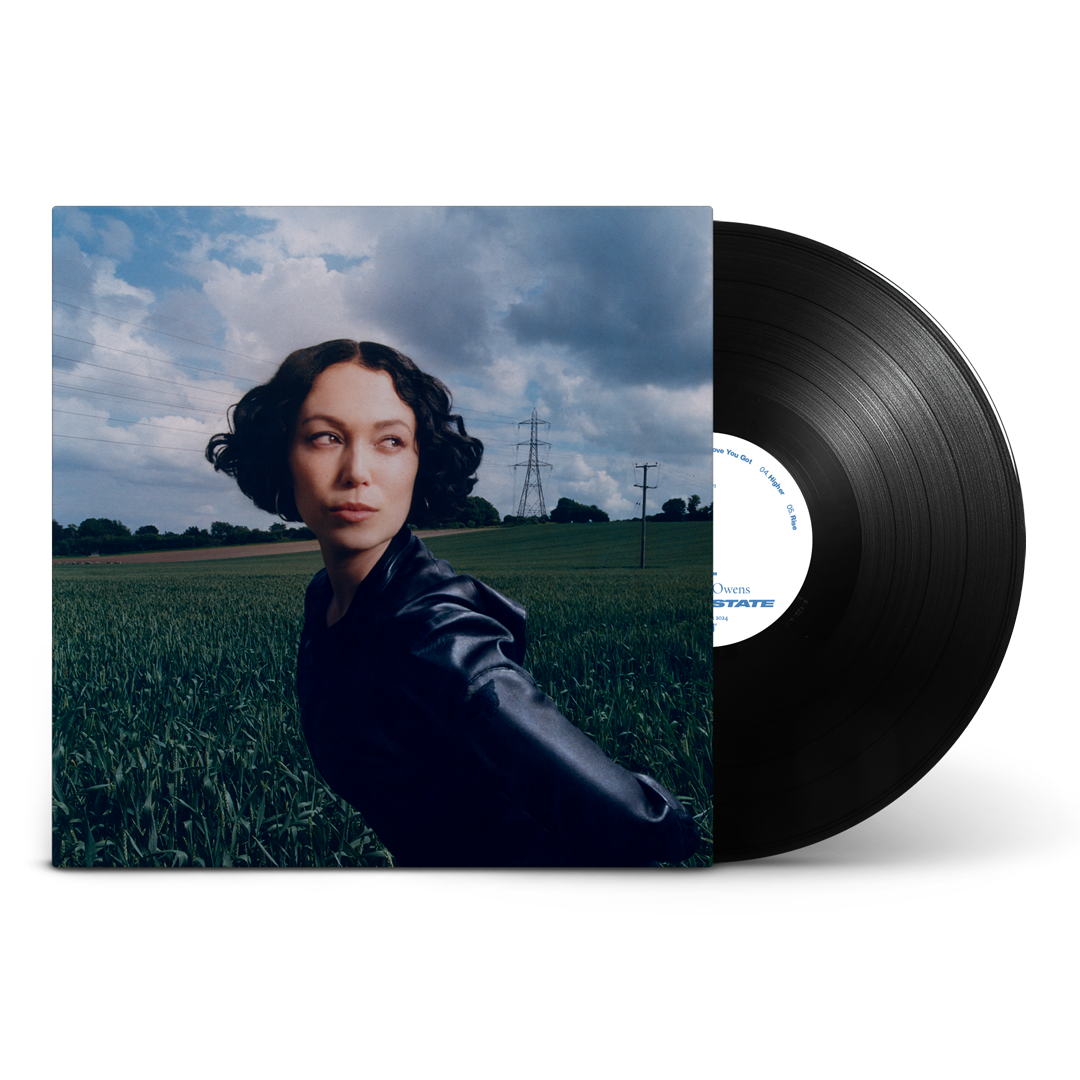 Kelly Lee Owens Dream State vinyl record cover showing her in a green field.