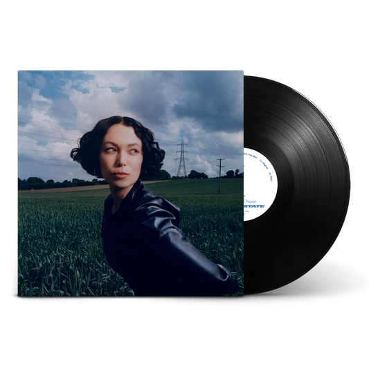 Kelly Lee Owens Dream State vinyl record cover showing her in a green field.