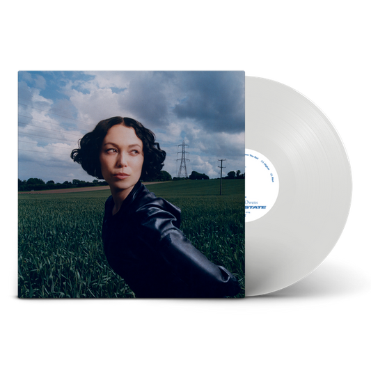 Kelly Lee Owens Dream State album cover art next to a white vinyl record.