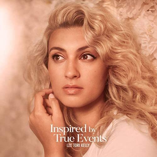 Tori Kelly album cover: close-up of a woman with blonde curly hair.