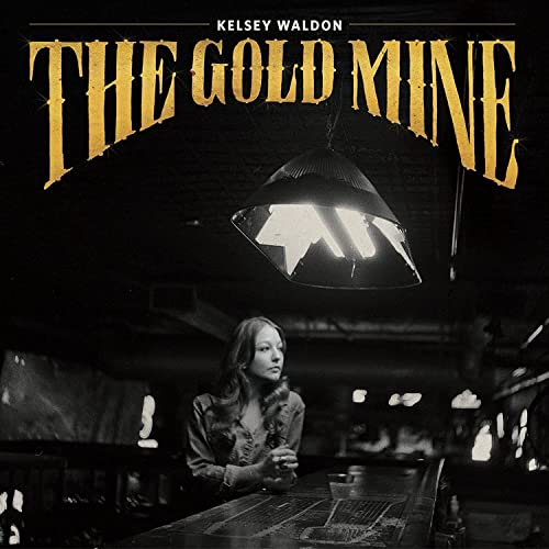 Album cover for Kelsey Waldon’s “The Goldmine,” featuring a woman and lamp.