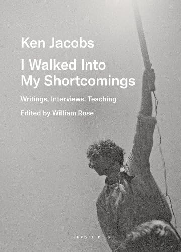 Book cover: black and white photo of a man reaching upwards.