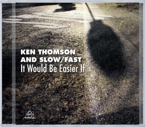 Album cover with shadowy figure on road, text "Ken Thomson and Slow/Fast" and title.
