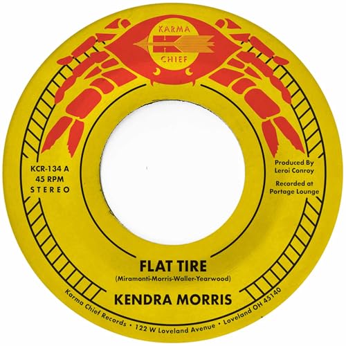 Yellow vinyl record label with red bird design and “Kendra Morris” text.
