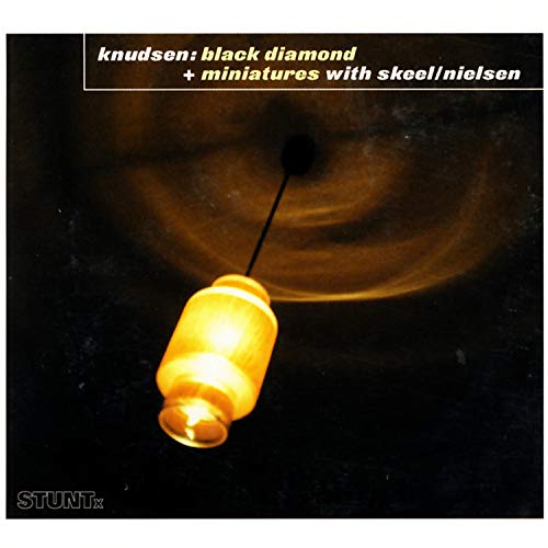 CD cover showing a glowing pendant lamp against a dark, abstract background.