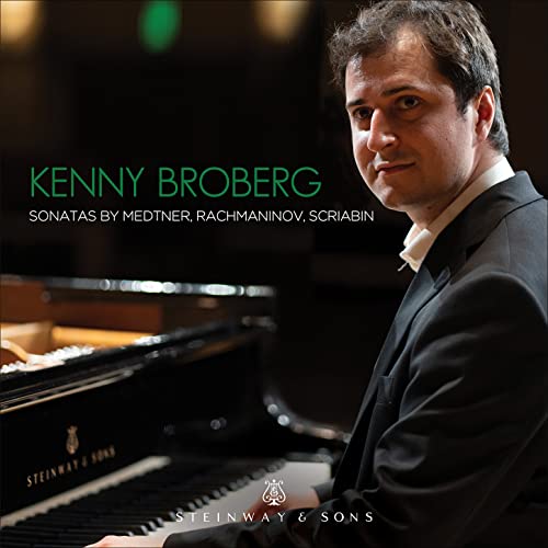 Pianist Kenny Broberg sits at a Steinway piano, album cover art.