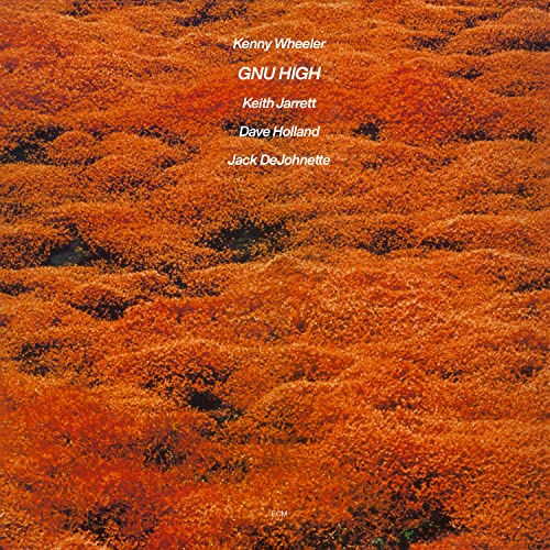 Vinyl record of Kenny Wheeler’s “Gnu High” album, black cover with abstract art.