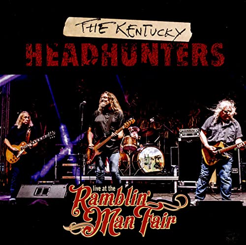 Kentucky Headhunters band performing live on stage with instruments.