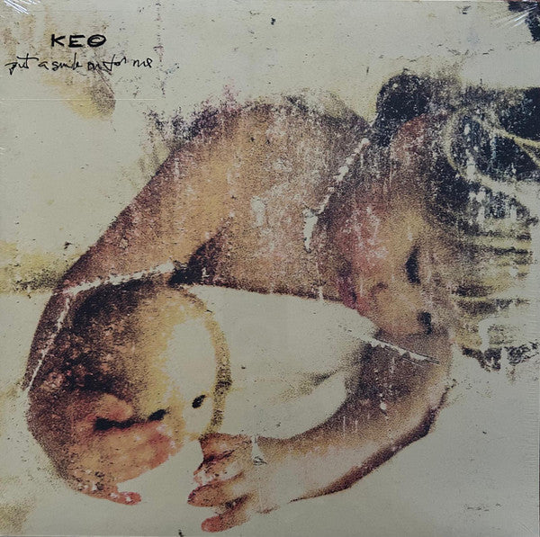 Keo album cover, “Put A Smile On For Me”, with blurred portrait.