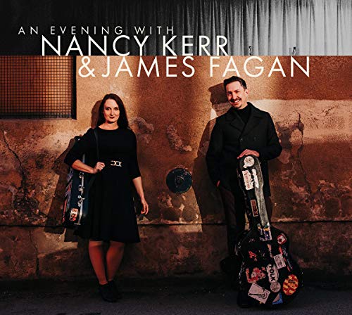 "Album cover featuring a man and woman standing by a stone wall."