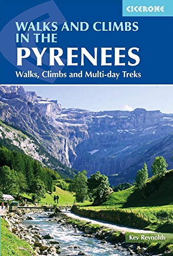 Mountain guidebook with maps, photos, and text on rugged outdoor activities in Pyrenees.