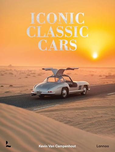 Silver classic car with open gull-wing doors on a desert road.