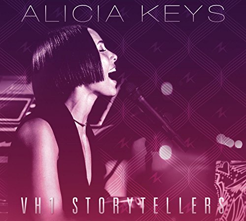 Alicia Keys singing into a microphone on the "VH1 Storytellers" CD cover.