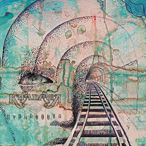 Album cover with a surreal, dotted face and a railway track.