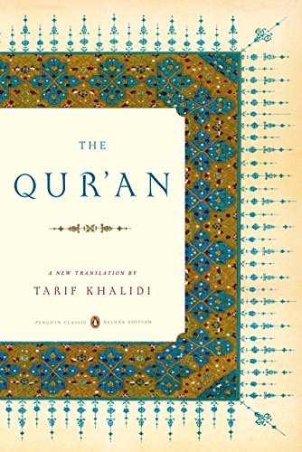 Book cover of “The Qur’an” with ornate teal and gold Islamic design.