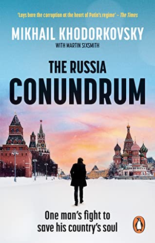 Book cover: man facing St. Basil’s Cathedral in snowy Red Square, Russia.