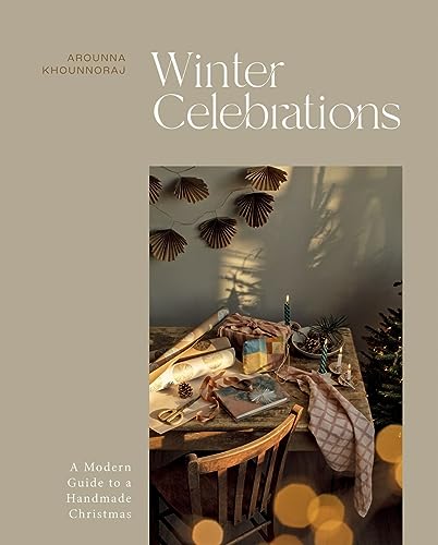 Book cover: "Winter Celebrations" with a decorated table and Christmas tree.