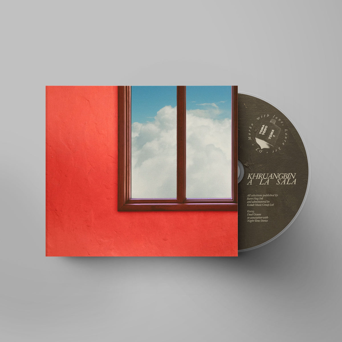 Khruangbin’s “A LA SALA” CD with a window and sky cover art.