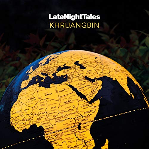 An illuminated globe showing Africa against a dark background with text above.