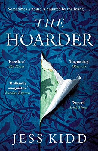 Book cover with blue leaf pattern, torn center revealing a green wolf silhouette.
