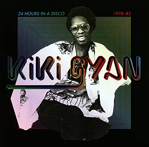 Vinyl album cover featuring a man in sunglasses with multicolored text overlay.