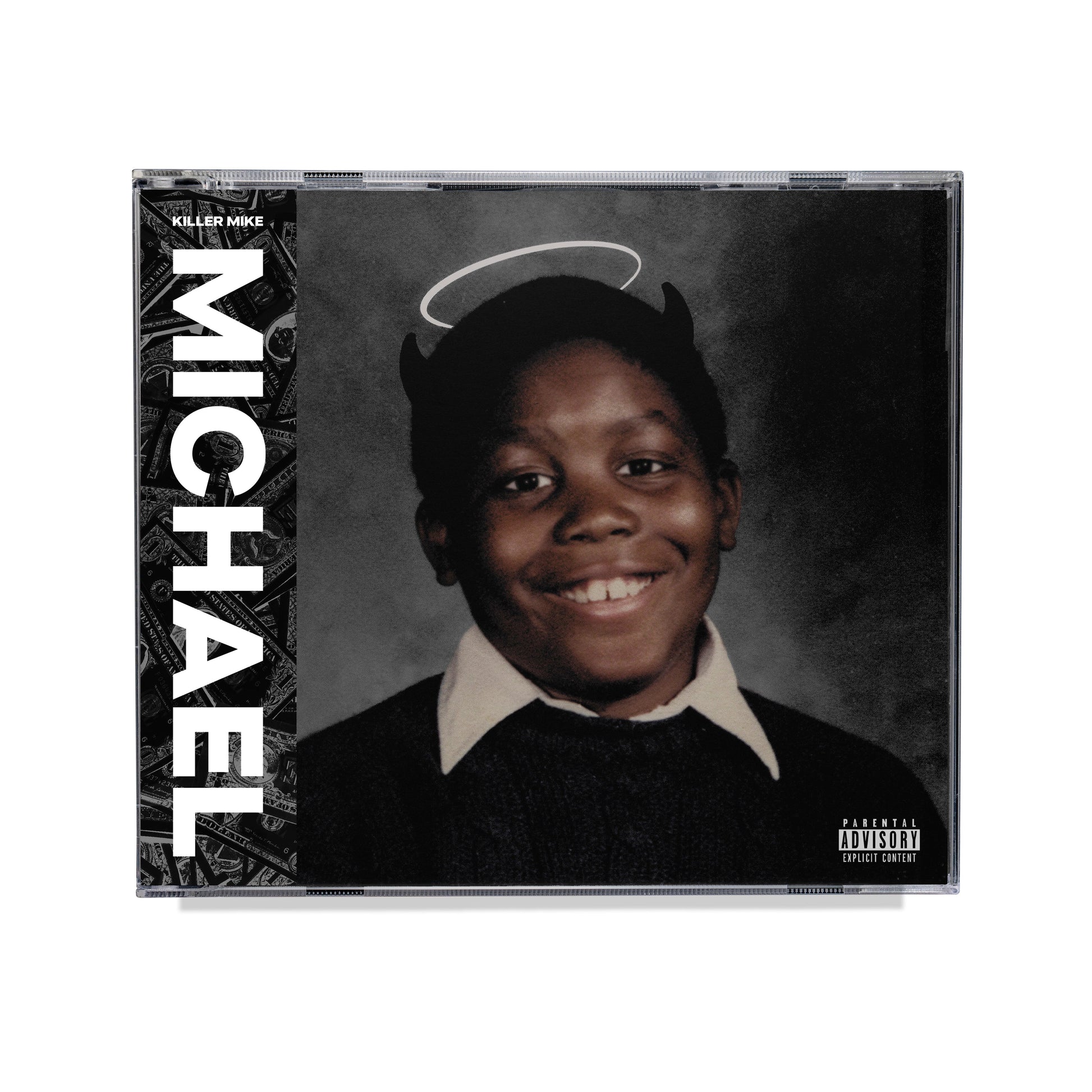 "CD case with a black-and-white portrait of a smiling boy with devil horns and halo."