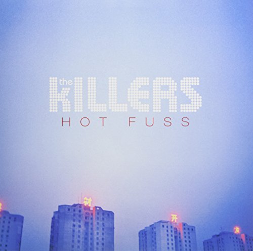 The Killers’ “Hot Fuss” album cover with a city skyline background.