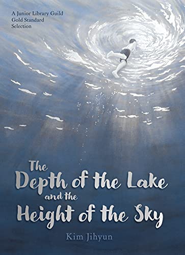 A child swims near the surface of a blue lake with light filtering through water.