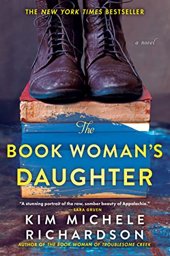 Book cover with worn boots on stacked books, titled "The Book Woman's Daughter".