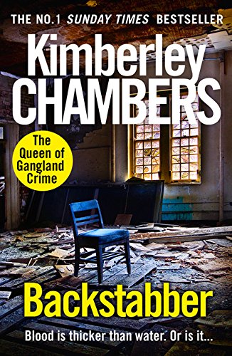 Book cover: "Backstabber" by Kimberley Chambers, featuring a dilapidated room.