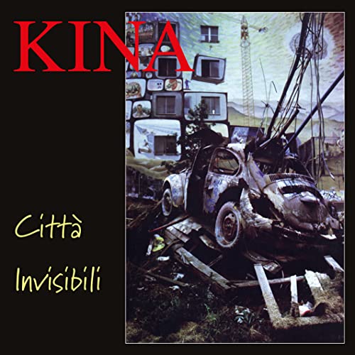 Vinyl album cover: wrecked cars and televisions in a landscape.