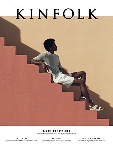 Kinfolk magazine cover, Volume 31, featuring a man on pink stairs.