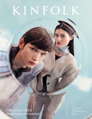 Kinfolk magazine cover featuring two young people looking downward, distorted reflection.