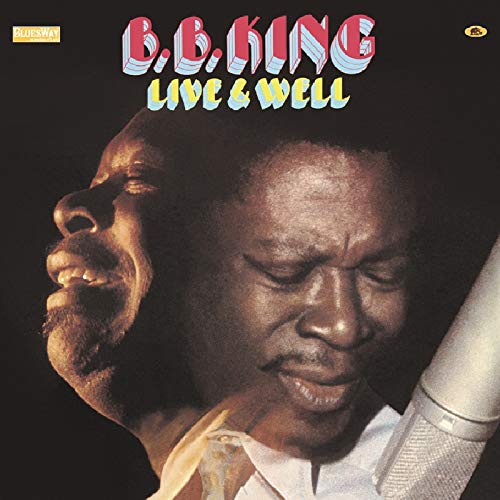 B.B. King’s “Live & Well” album cover featuring a portrait of the artist.