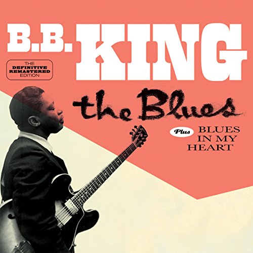 B.B. King playing an electric guitar on a red and white album cover.