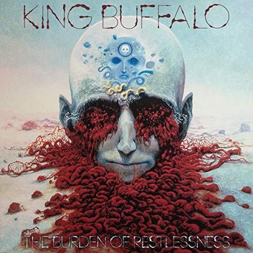 Album cover for King Buffalo’s “The Burden of Restlessness,” surreal portrait.