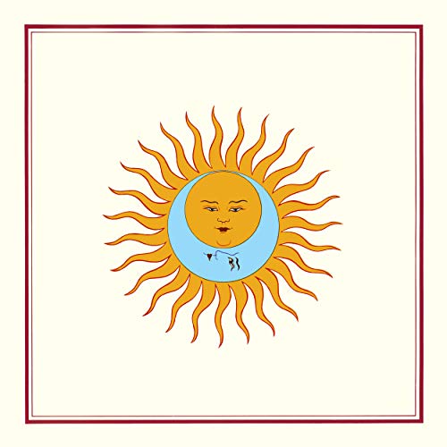 Album cover: stylized sun with a human face and radiating rays.